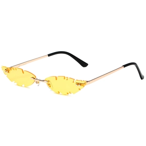 Futuristic gold metal rimless sunglasses with unique yellow leaf shaped lenses for parties