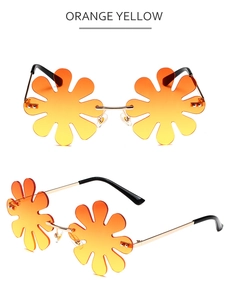 Detail of flower-shaped frameless sunglasses with orange yellow gradient lenses