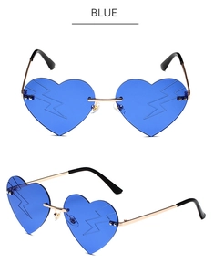 Detail of blue heart-shaped rimless sunglasses with unique lightning pattern engraving