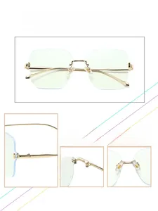 Macro details of frameless anti-blue light glasses with gold metal temples and clear lenses