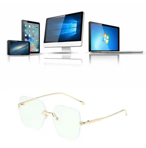 Detail of rimless blue light blocking glasses with gold metal temples and square lens