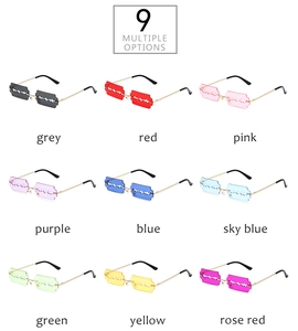 Macro view showing nine color options for razor blade shaped rimless metal sunglasses