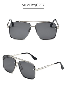 Detailed view of silver double bridge metal frame and grey lenses on pilot sunglasses