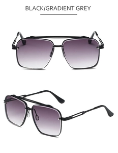 Detail view of double bridge pilot sunglasses with black frames and gradient grey lenses