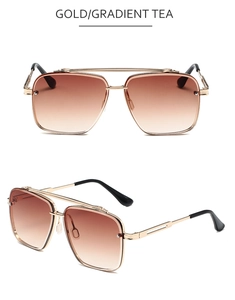 Detail view of gold double-bridge pilot sunglasses with gradient tea lenses and metal frame