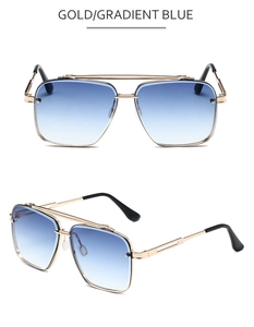 Detail of double bridge metal aviator sunglasses with gold frames and gradient blue lenses