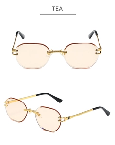 Close-up of rimless polygon tea sunglasses with textured gold temples and nose bridge