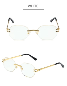 Detail of octagonal rimless sunglasses with gold metal frame and twisted wire temples