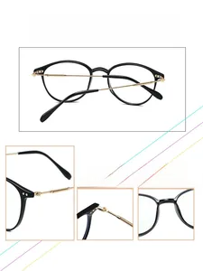 Detail view of vintage round frame glasses with blue light blocking and gold metal hinges