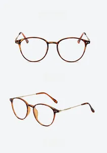Front and side view of round leopard print glasses with gold metal frames and temples