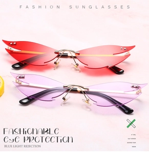 Detail of rimless cat-eye sunglasses with flame-shaped lenses in red and purple