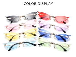 Color display of frameless flame-shaped cat eye sunglasses in eight vibrant Y2K style tints