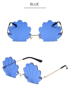 Detailed view of blue flower shell-textured rimless sunglasses with gold metal temples