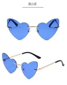 Detail view showing blue heart-shaped rimless sunglasses with gold metal temples