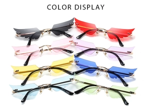 Detailed color display of creative wing-shaped rimless sunglasses in eight vibrant colors