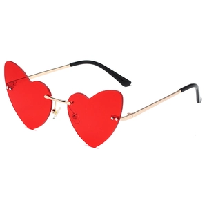 Frameless heart shaped sunglasses with red lenses and elegant gold metal frame for women