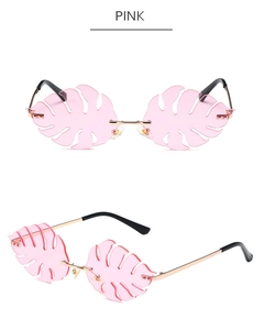 Front and side view of pink monstera leaf shaped rimless sunglasses with gold metal frame