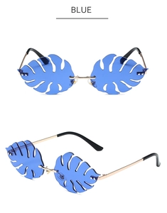 Detail of leaf-shaped blue ocean lenses with creative gold metal frames for party wear