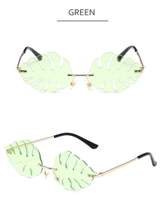 Detail of green leaf shaped rimless sunglasses with gold metal temples and laser texture