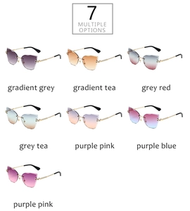 Multiple color options of frameless cat eye sunglasses with gradient lenses and metal temples
