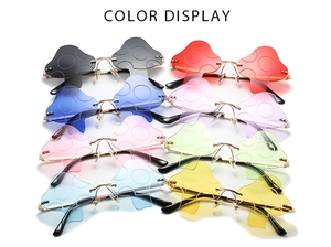 Multi-color display of rimless mushroom shaped sunglasses with metallic frames in 8 colors