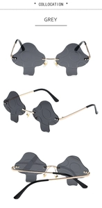 Detailed view of mushroom-shaped grey sunglasses with golden metal frames from three angles