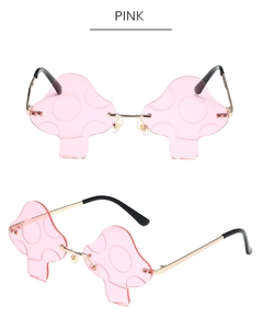 Detail view of pink mushroom-shaped rimless sunglasses with gold metal temples