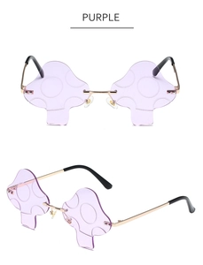 Detailed view of purple mushroom-shaped rimless sunglasses with polka dot pattern lens