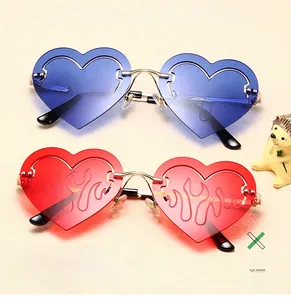 Detail of heart-shaped flame sunglasses with blue and red lenses and metal frames