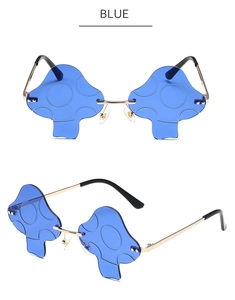 Detail view of mushroom-shaped rimless sunglasses with blue lenses and gold metal frames