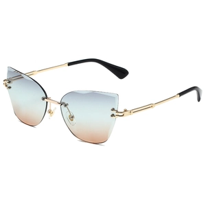 Frameless cat-eye sunglasses with blue-orange gradient lenses and gold metal frames