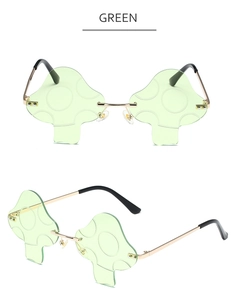 Detail view of green mushroom-shaped rimless sunglasses with gold metal temples