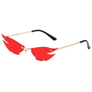 Trendy rimless cat eye sunglasses with red flame-shaped lenses and gold metal frames