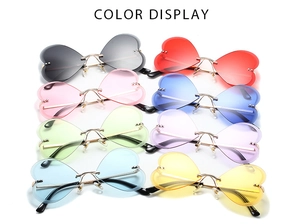 Vue détaillée de lunettes de soleil sans monture en forme de cœur en huit couleurs
