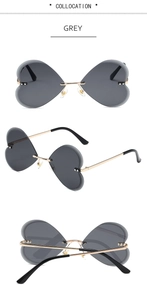 Vues sous trois angles de lunettes de soleil coeur sans monture avec verres gris et or