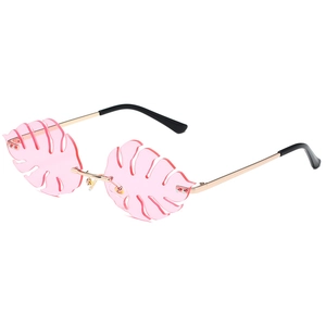 Pink monstera leaf-shaped sunglasses with gold metal frame for party and fashion