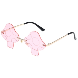 Pink mushroom-shaped rimless sunglasses with gold metal frame and lens pattern
