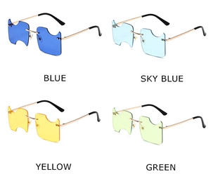 Close-up of rimless metal sunglasses with unique notched edges in four vibrant colors