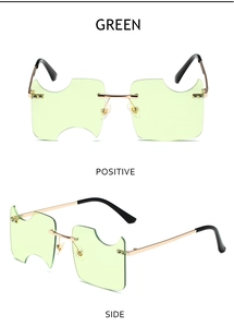 Detail of rimless green lenses with gold metal bridge and irregular arc edges