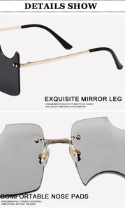 Detail of rimless cat-ear shaped sunglasses with golden metal temples and soft nose pads