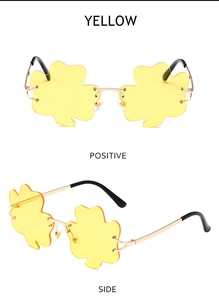 Detailed front and side view of yellow clover sunglasses with a gold metal frame