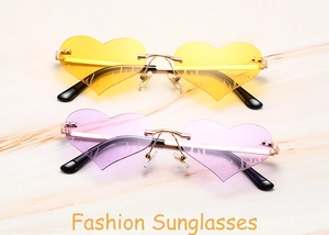 Detail of rimless heart sunglasses with gradient lenses and flame pattern engraving
