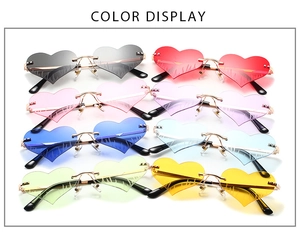 Detailed color display of rimless heart sunglasses in eight vibrant gradient lens shades