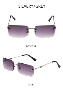 Detailed macro view of rimless square sunglasses with engraved silver metal cross temples