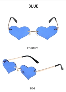 Frameless blue heart-shaped sunglasses with flame edge detail and golden metal frame