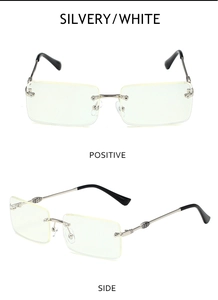 Detail view of rimless square metal sunglasses with silver frame and black temple tips