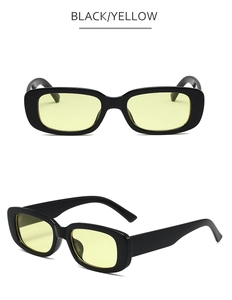 Gros plan de lunettes de soleil rectangulaires noires rétro avec verres jaunes