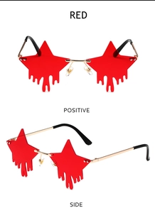 Detail view of red star-shaped rimless sunglasses with fluid drip effect and gold frame