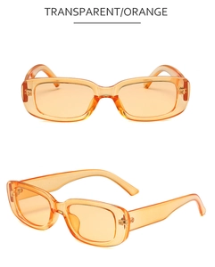 Vue détaillée de lunettes de soleil rectangulaires rétro en orange transparent chic
