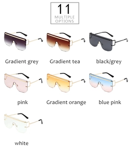 Collection of oversized shield sunglasses in various gradient lens colors and gold trim